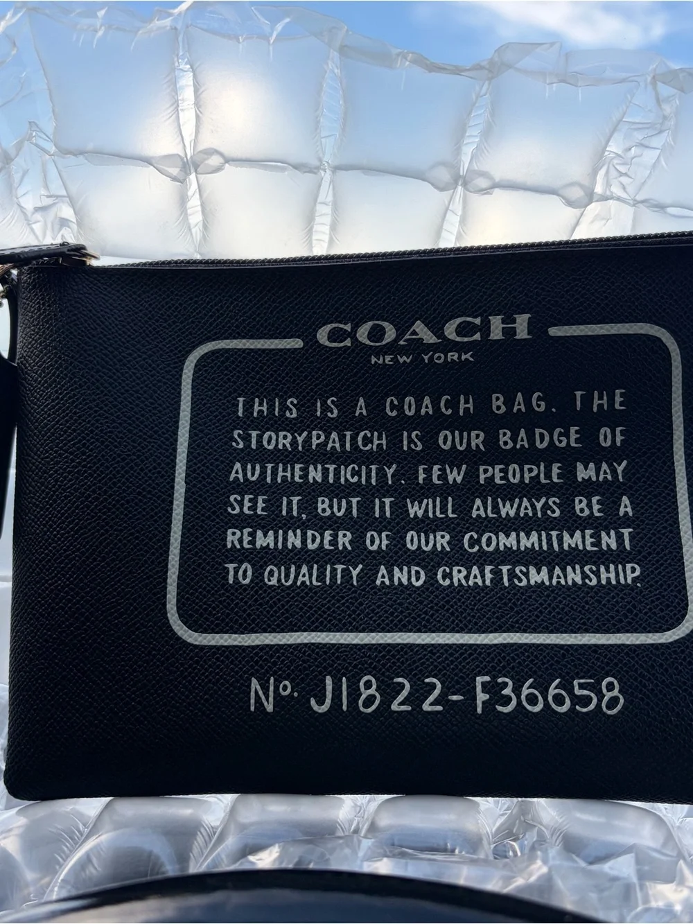 Coach Black Leather Wristlet Pouch with White story patch